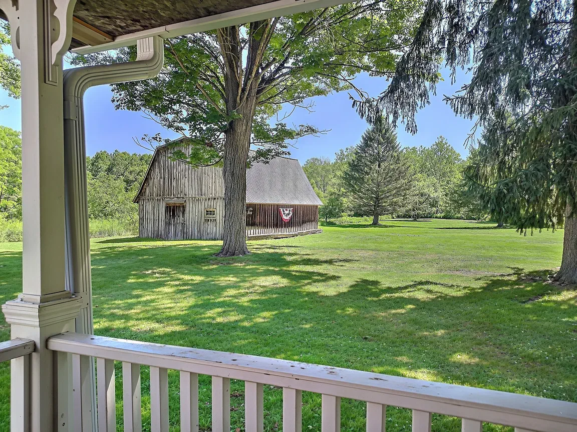 A Creek-Side Homestead With Two Barns, Ready to Reimagine