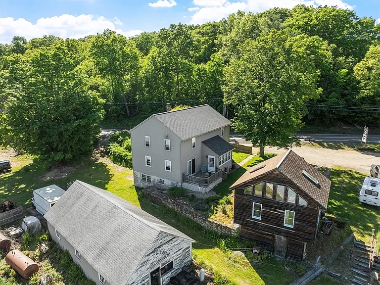 A Home With Its Own Five-Greenhouse Growing Operation