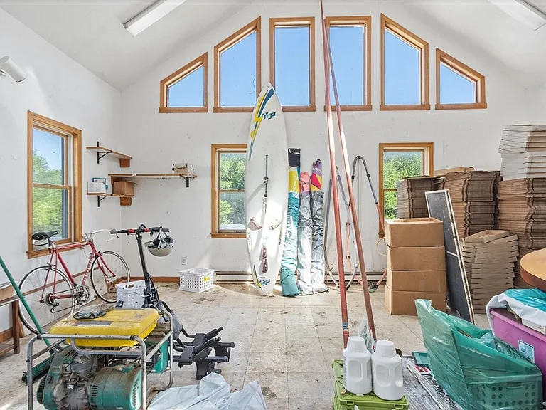 A Home With Its Own Five-Greenhouse Growing Operation