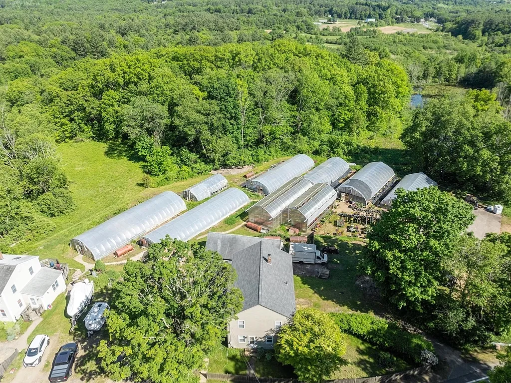 A Home With Its Own Five-Greenhouse Growing Operation