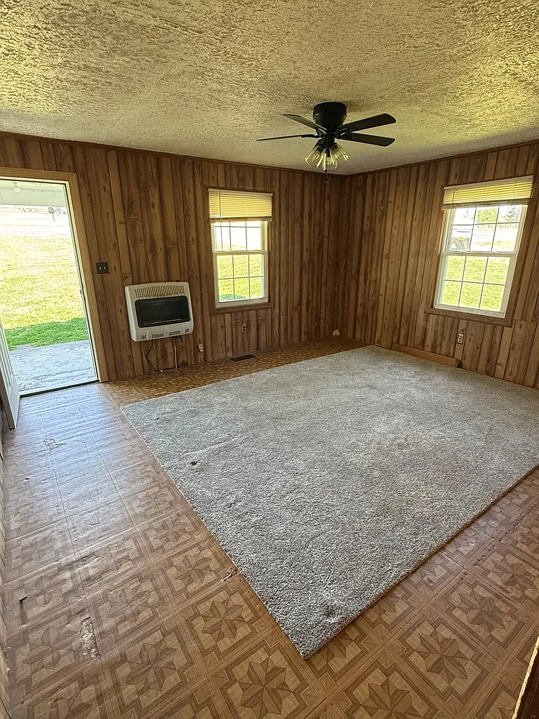Cottage with Spring-Fed Pond and Fenced Field on 4.59 Acres Near the New River
