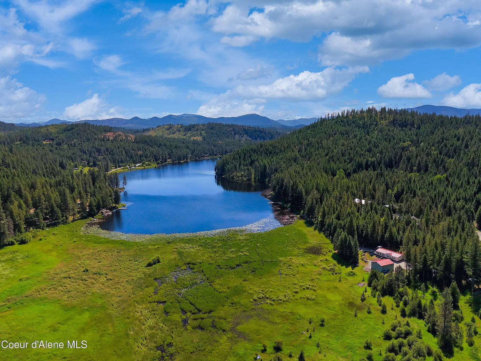 2020-Built Waterfront Retreat with 160 Feet of Private Kelso Lake Frontage, 5.5 Acres, and a 30x40 Shop Near Farragut State Park