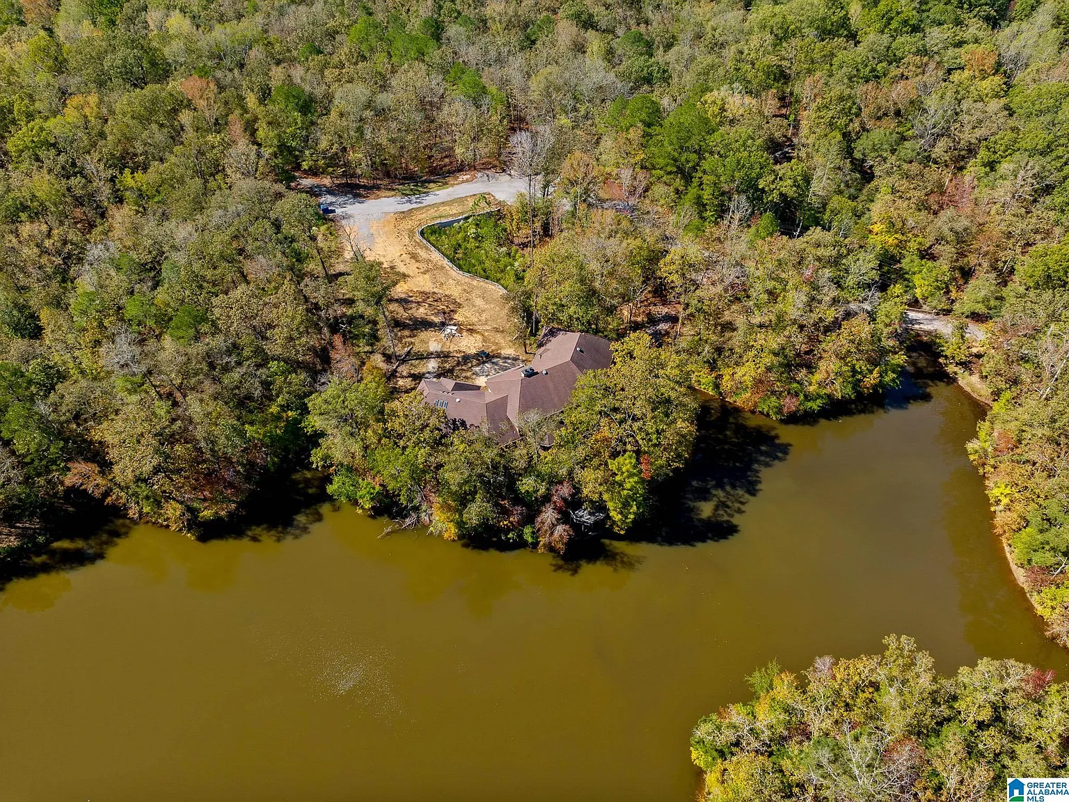 A Lakeside Estate on 9 Acres, Ready to Reimagine From the Studs Up