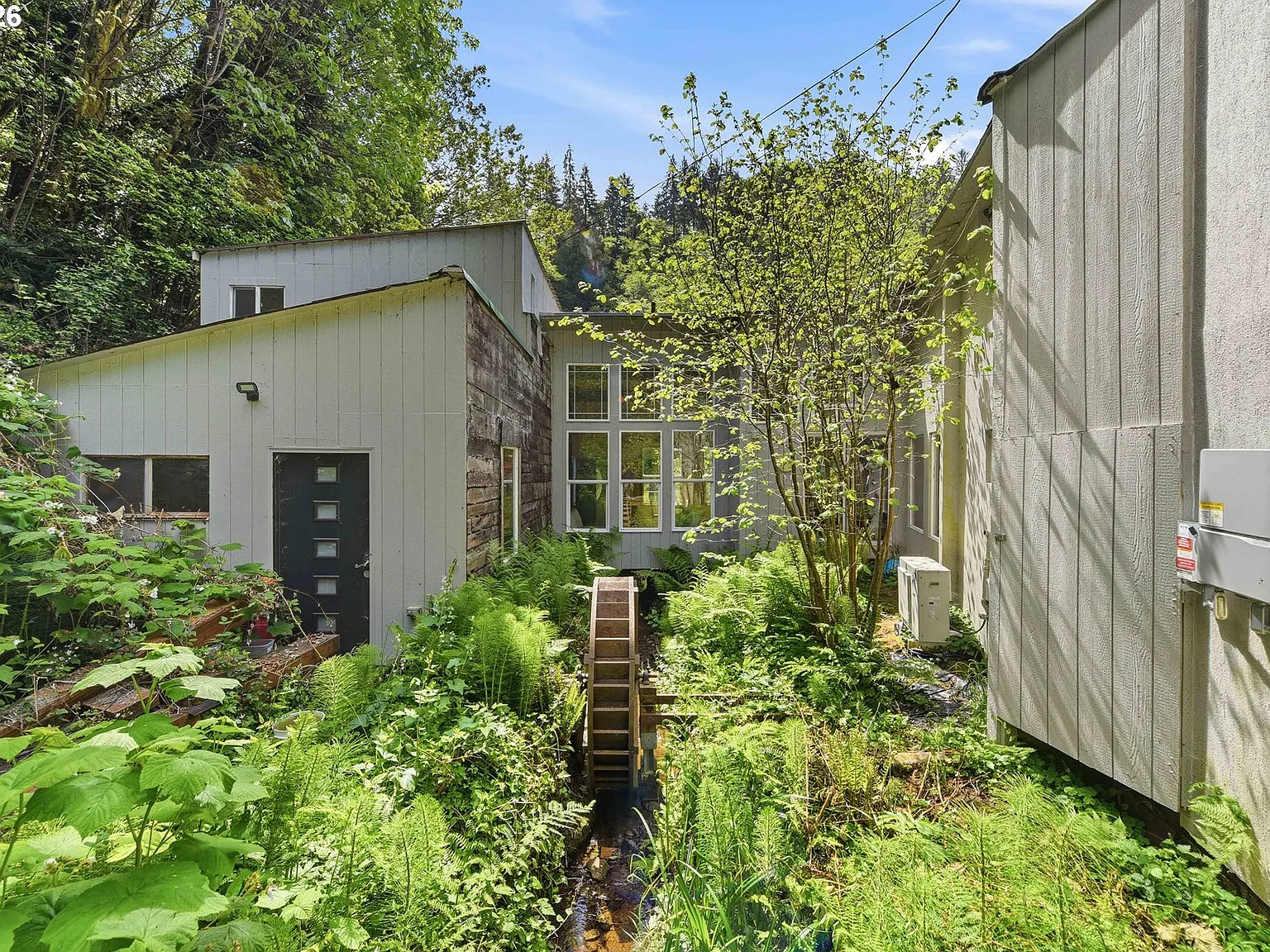 Lodge-Style Home with Salmon Stream on 22 Acres Bordering BLM and Elliott State Forest