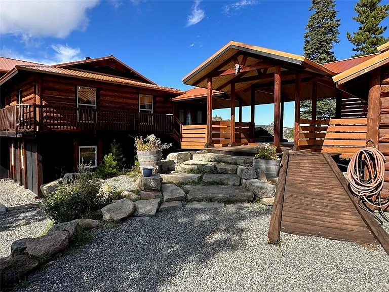 A Hand-Built Log Cabin, 31 Acres Past Where the Plow Stops