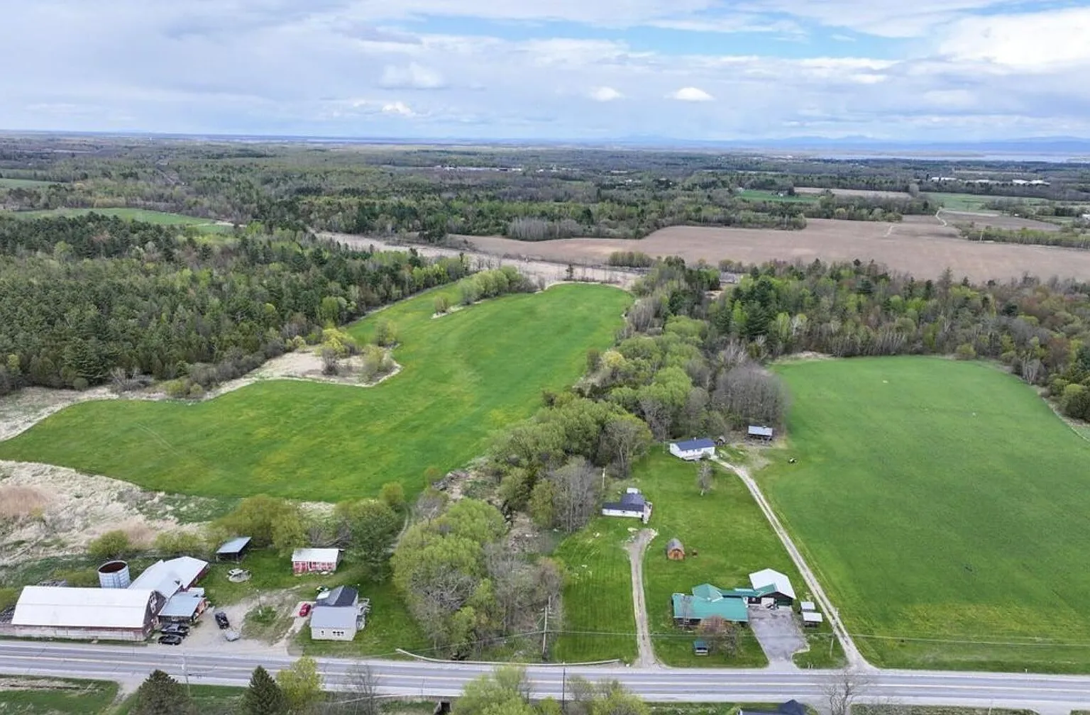 Four-Home Farm with Dairy Barn and Maple Sugar Shack on 168 Acres in West Chazy