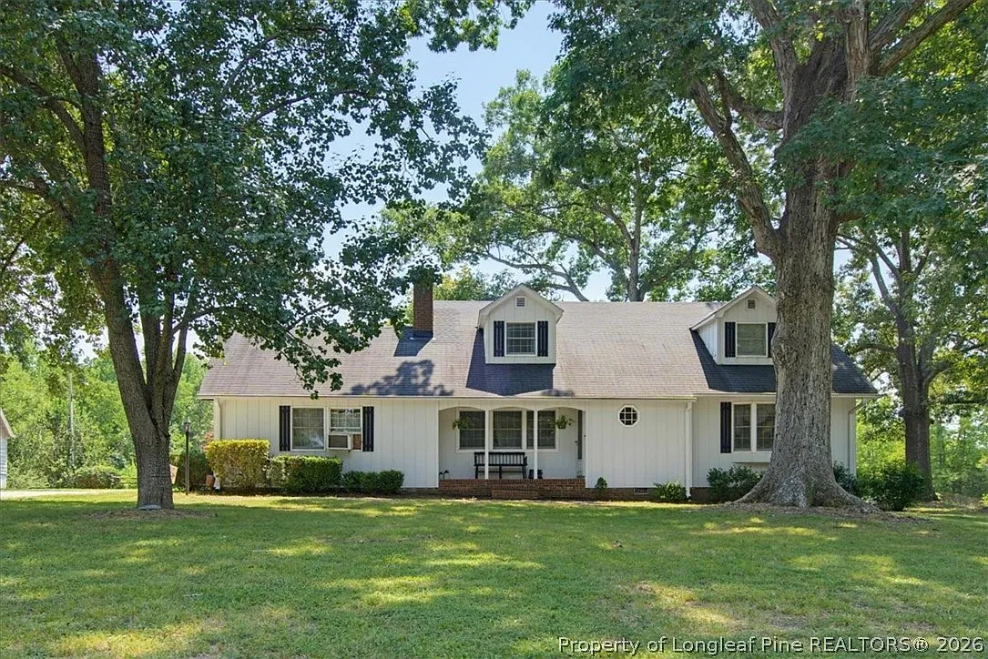 A Farmhouse With Its Own Barn on 9 Wooded Acres
