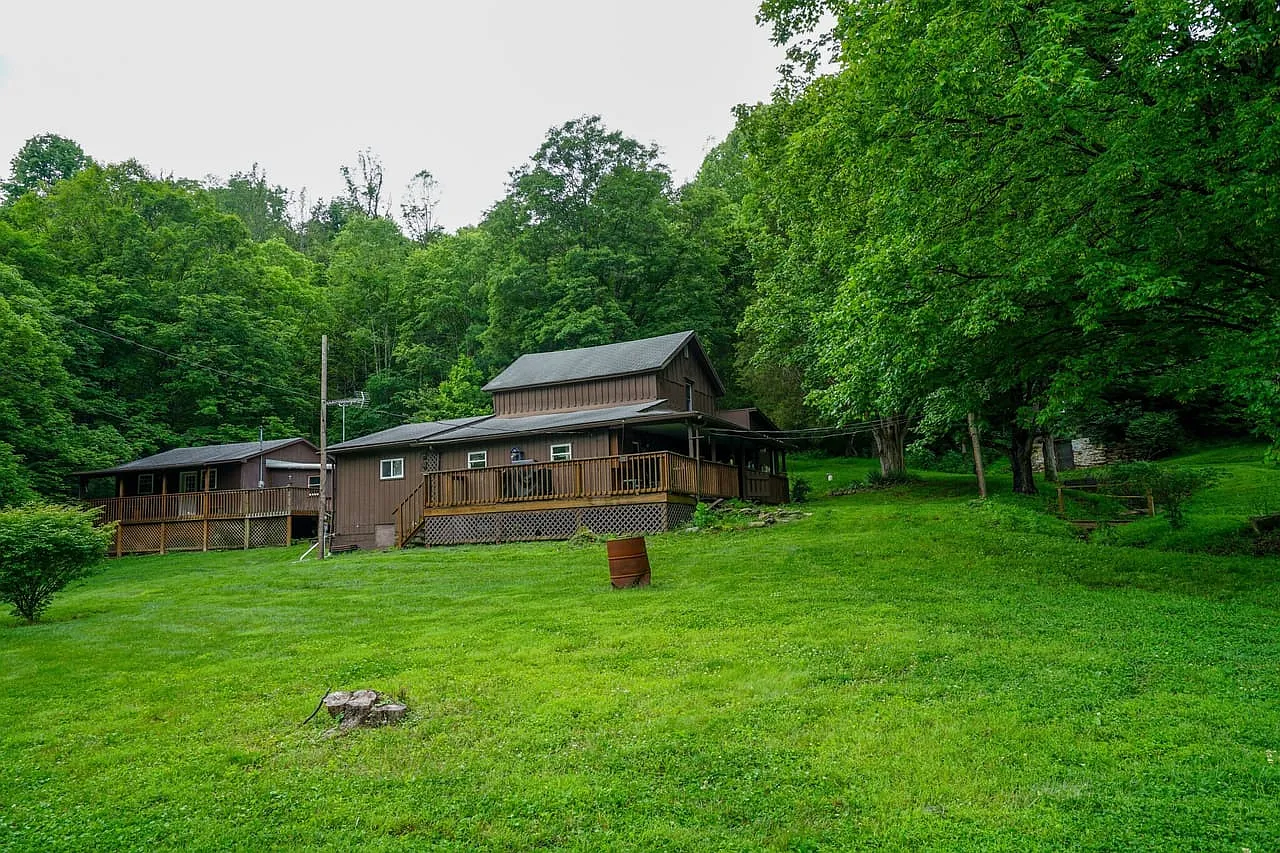Farmhouse and Cabin on 57 Acres with a Cave and Waterfall in Noble County