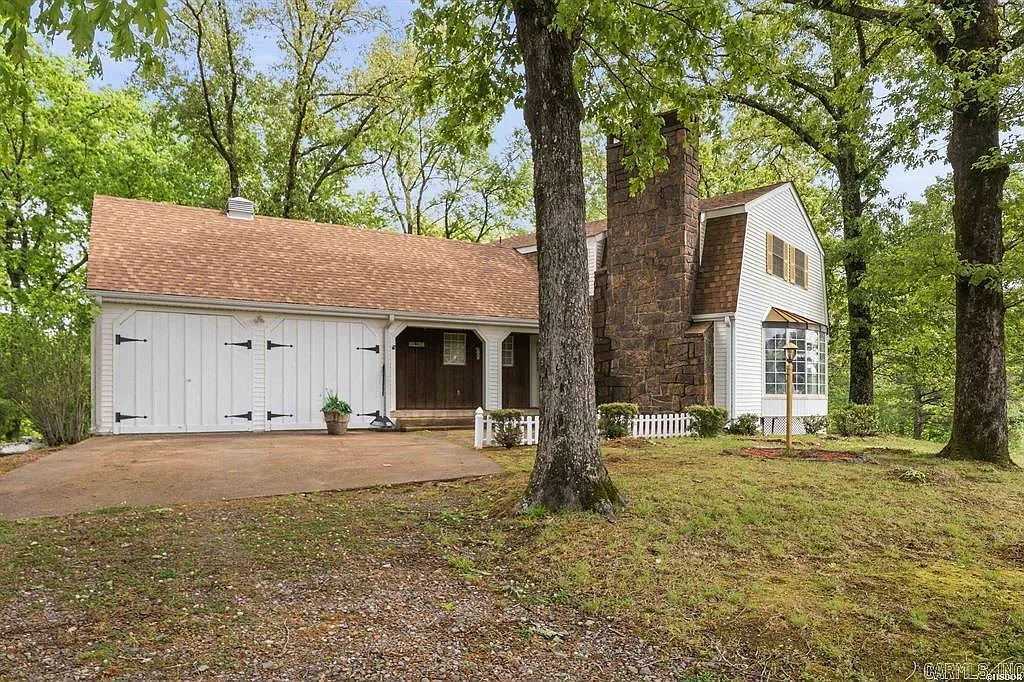 One-Owner Homestead with Private Pond on 11 Rolling Acres in the Ouachita Mountains