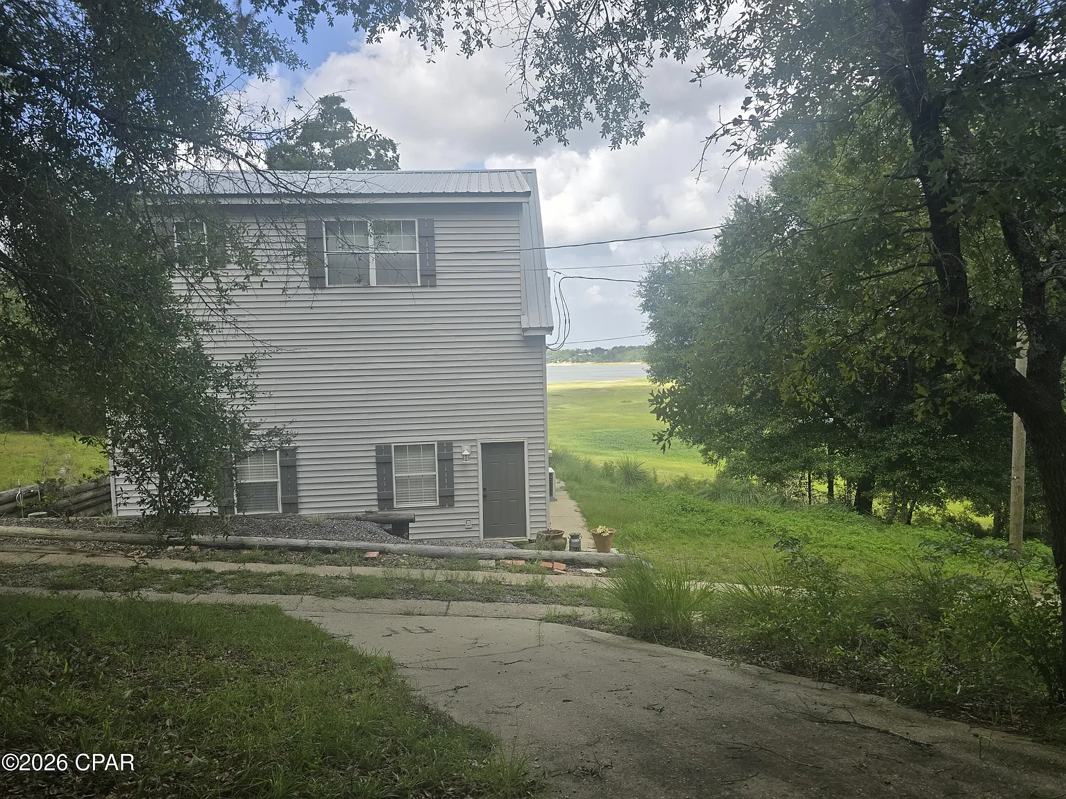 A Barn of Your Own on Nearly 2.4 Acres Above Porter Pond