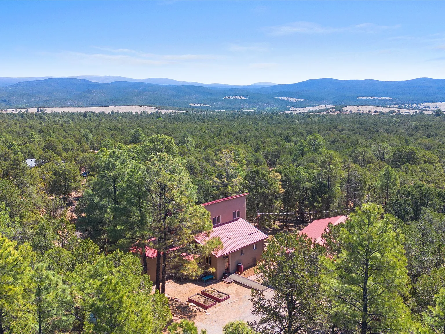 A Pine-Shaded Home With Rowe Mesa Views on 5 Private Acres