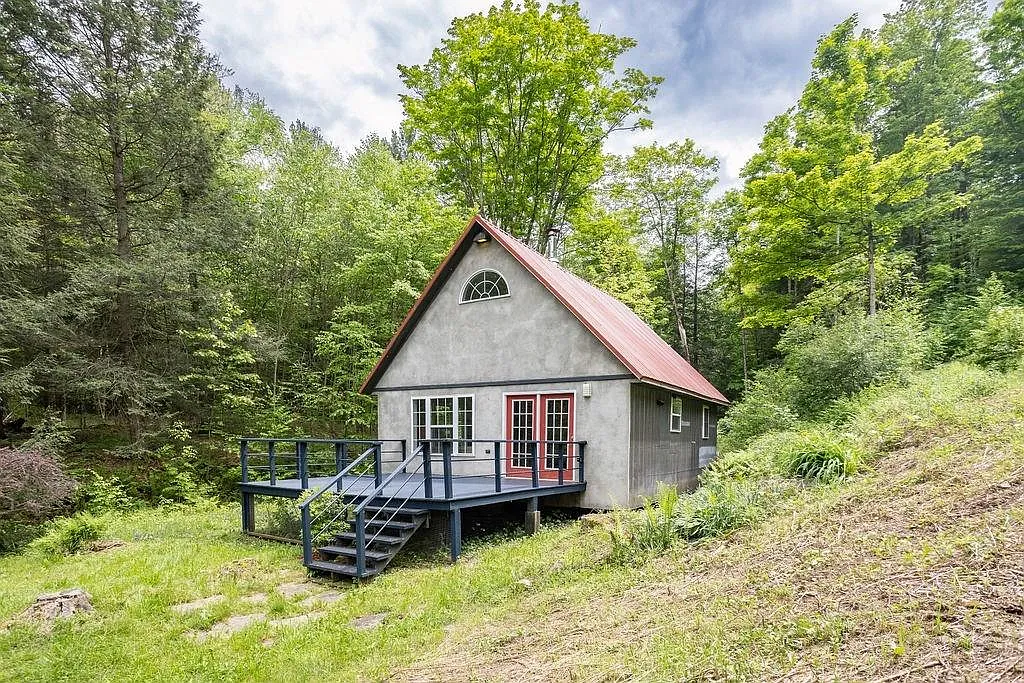 A Charming Cabin on 10 Wooded Acres Along a Babbling Stream