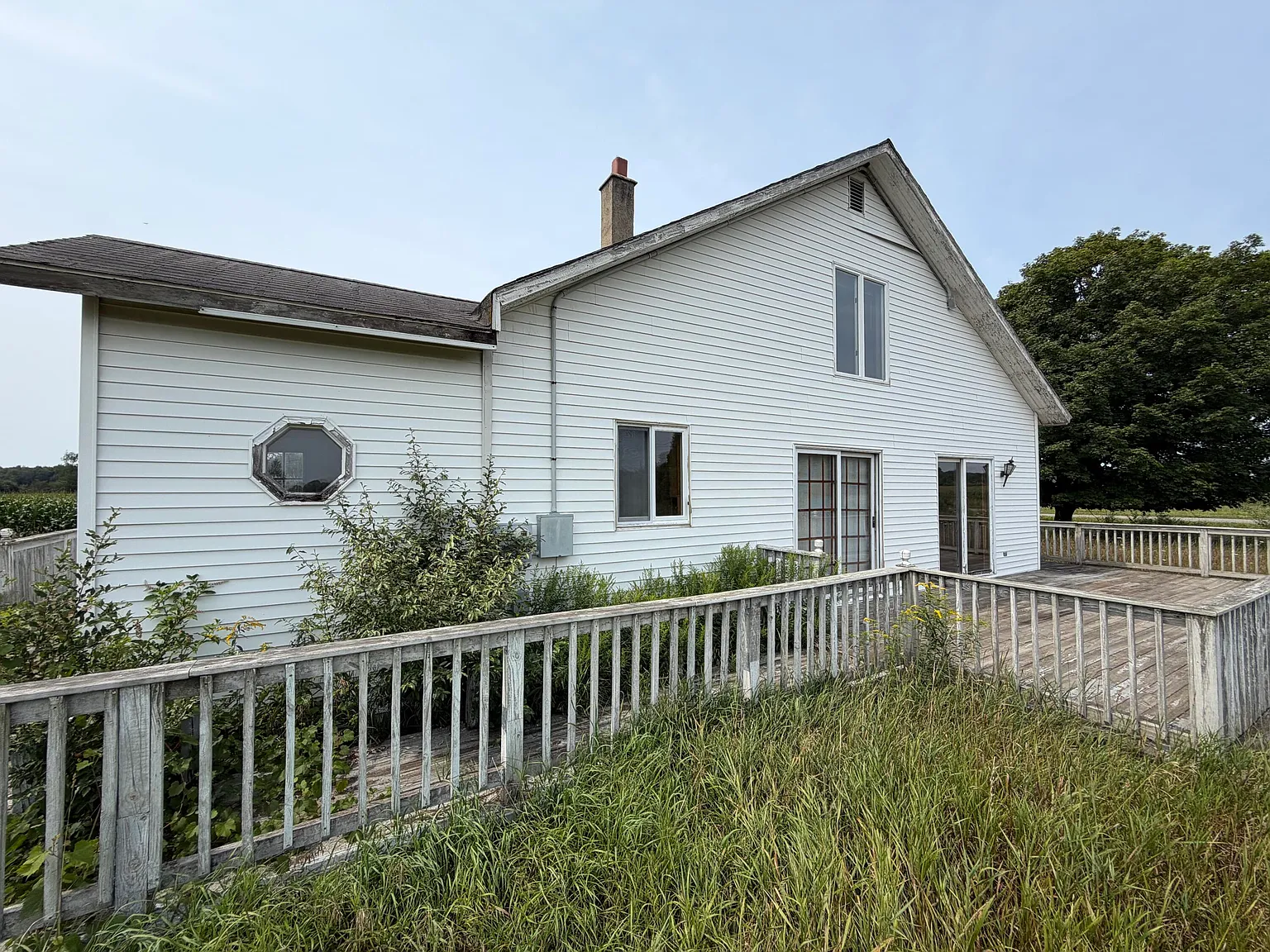A Fixer-Upper Farmhouse on 10 Wide-Open Acres