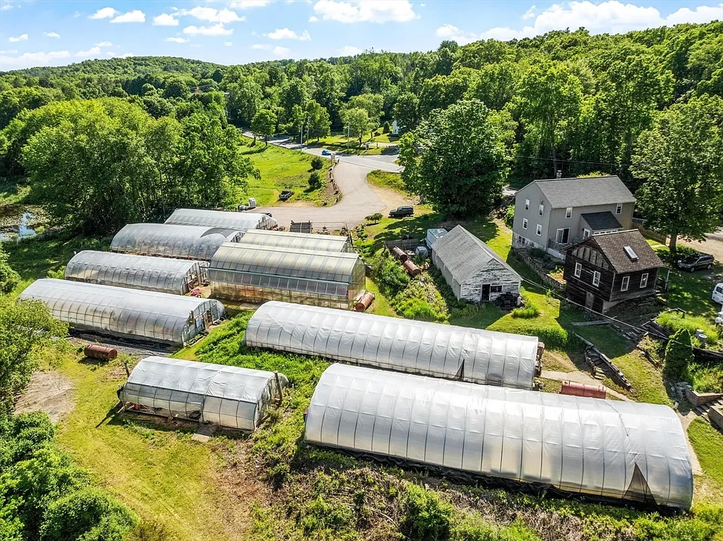 A Home With Its Own Five-Greenhouse Growing Operation